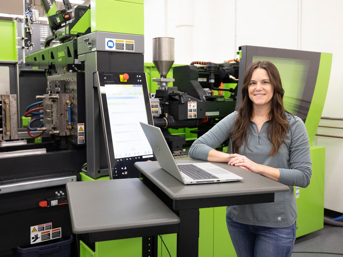 Heather Dietsche works in the plastics lab at UW-Stout, where she returned to college at age 27.
