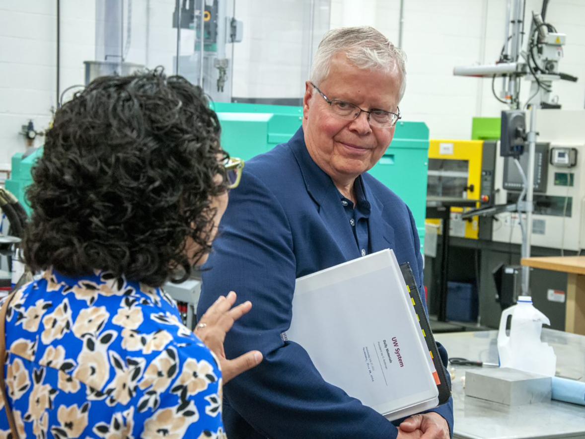 Provost Glendali Rodriguez talks with Jay Rothman during his stop in the university’s plastics engineering lab in Jarvis Hall Technology Wing.