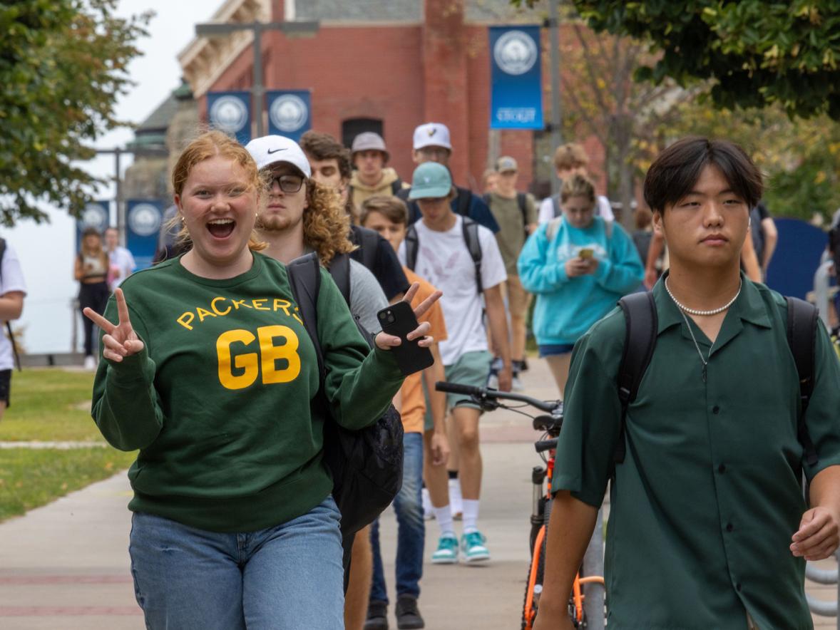 Students walk across the campus mall on the first day of fall semester classes at UW-Stout.
