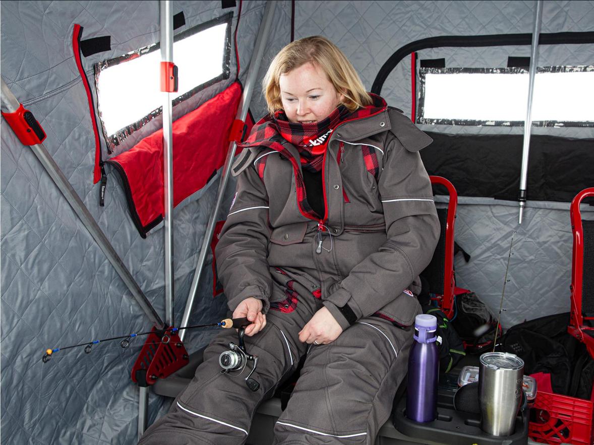 Sara Goodman, with Eskimo technical clothing and ice angling gear. Photo by Ardisam Inc.