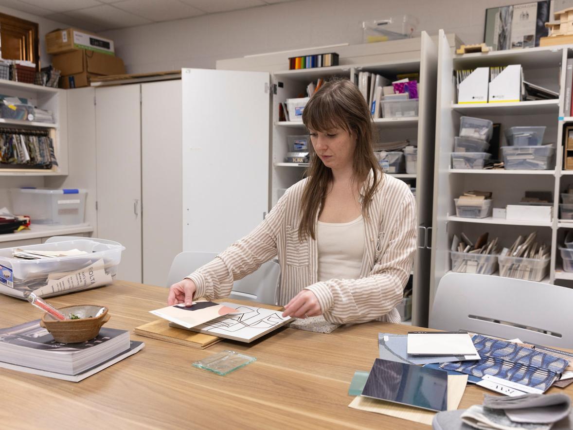 UW-Stout interior design major Khendra Thompson looks at samples in the interior design lab at UW-Stout's Applied Arts Building.