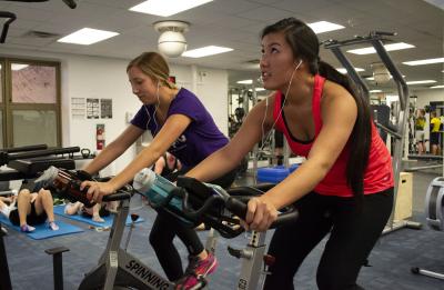 Students work out on the bicycle machines at UW-Stout's Health and Fitness Center.
