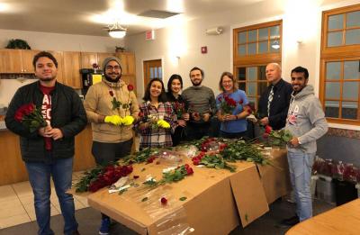 Fedi Soltani and other UW-Stout students preparing for Rose Delivery Day.