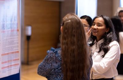 A student presents at Research Day.