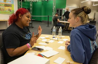 Girls in game design lab on campus