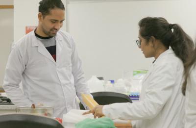 Rajesh Dangal, left, in the food process lab