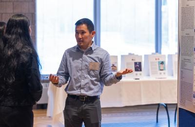 Luke Bickelhaupt at the poster presentation during Research Day.