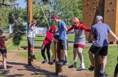 Stoutward Bound students at the Stout Adventures rope course.