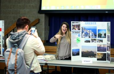 Student tabling at a study abroad fair