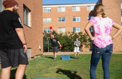 Students playing bean bags