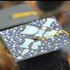 A graduation cap personalized with "I did it!"