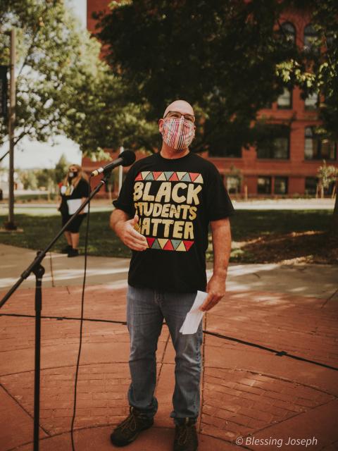 Jim Handley at a rally. Photo courtesy Blessing Opeyemi Photography