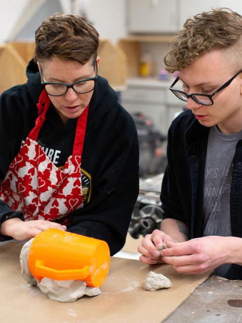 Jennifer Astwood and Alexandre Marble creating Made at Stout cups in 2019.