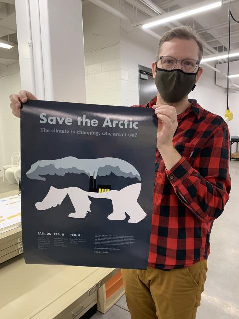 Digital Process Lab Manager Zach Kolden displays student work that was printed in the lab last fall.