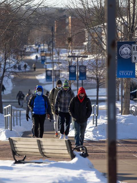 Students walk up the campus mall recently at UW-Stout.